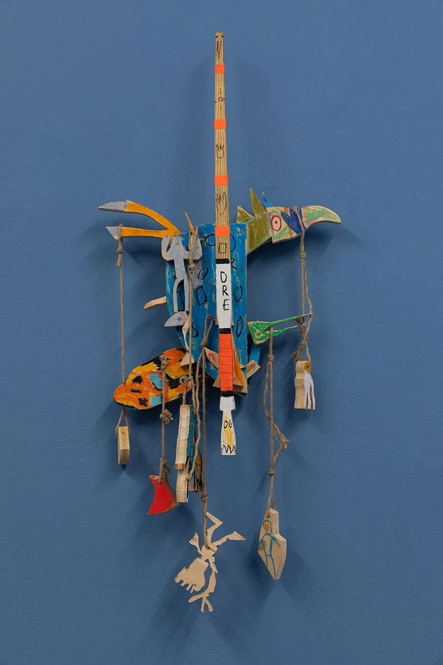 Detail of a small painted wood cutout creature figure from Ernst Koslitsch's wall installation, Beings & Creatures, rotor, Graz