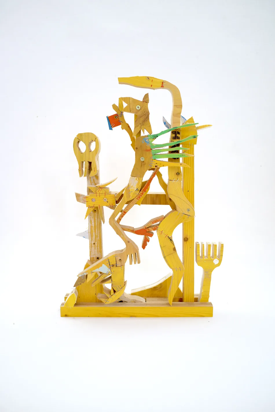 Detail of a small painted formwork-timber sculpture by Ernst Koslitsch, studio view