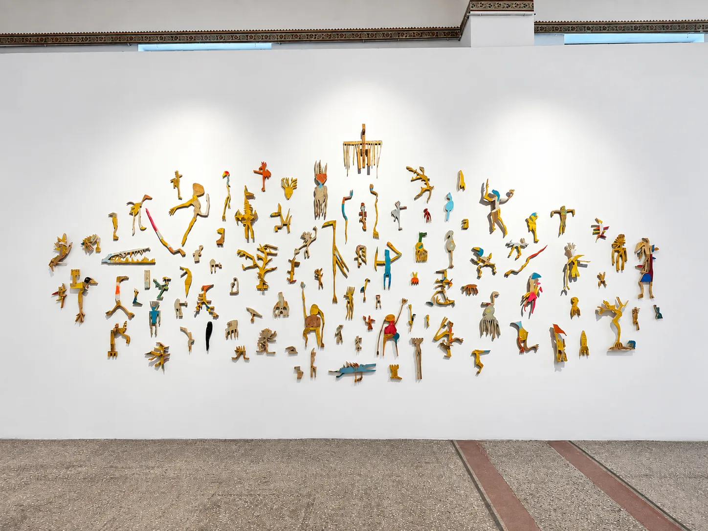 Installation view of the wall installation beneath an ornamental frieze, EX-SITU, Nationalmuseum Sarajevo, Ernst Koslitsch