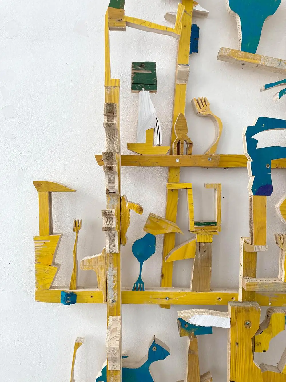 Detail view, Hashtag Forever, yellow and blue painted wood