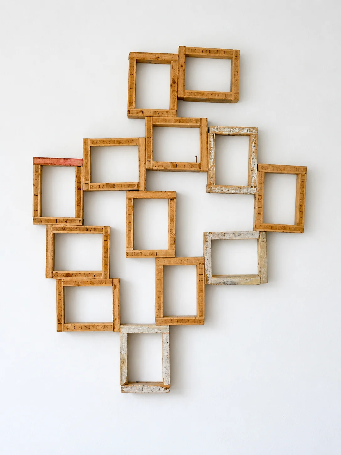 Wall sculpture made of empty wood frames, studio view, Ernst Koslitsch