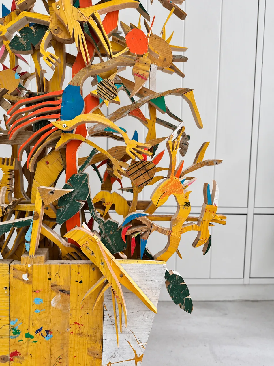 Close-up detail of painted wood bird and blossom silhouettes, Großer gelber Vogelbaum, Ernst Koslitsch